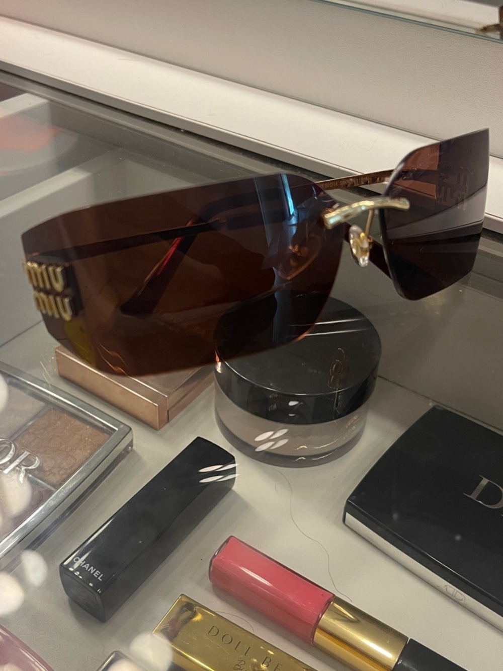 Miu Miu Brown Rimless Shield Sunglasses with Gold Accents